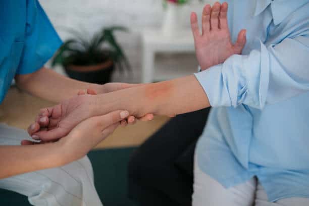 Surgeon is having a consultation with a patient that has an Abscess in her skin 