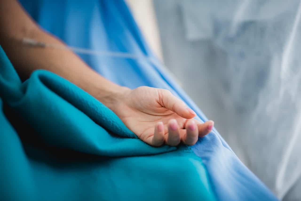 Patients hand before the surgery.