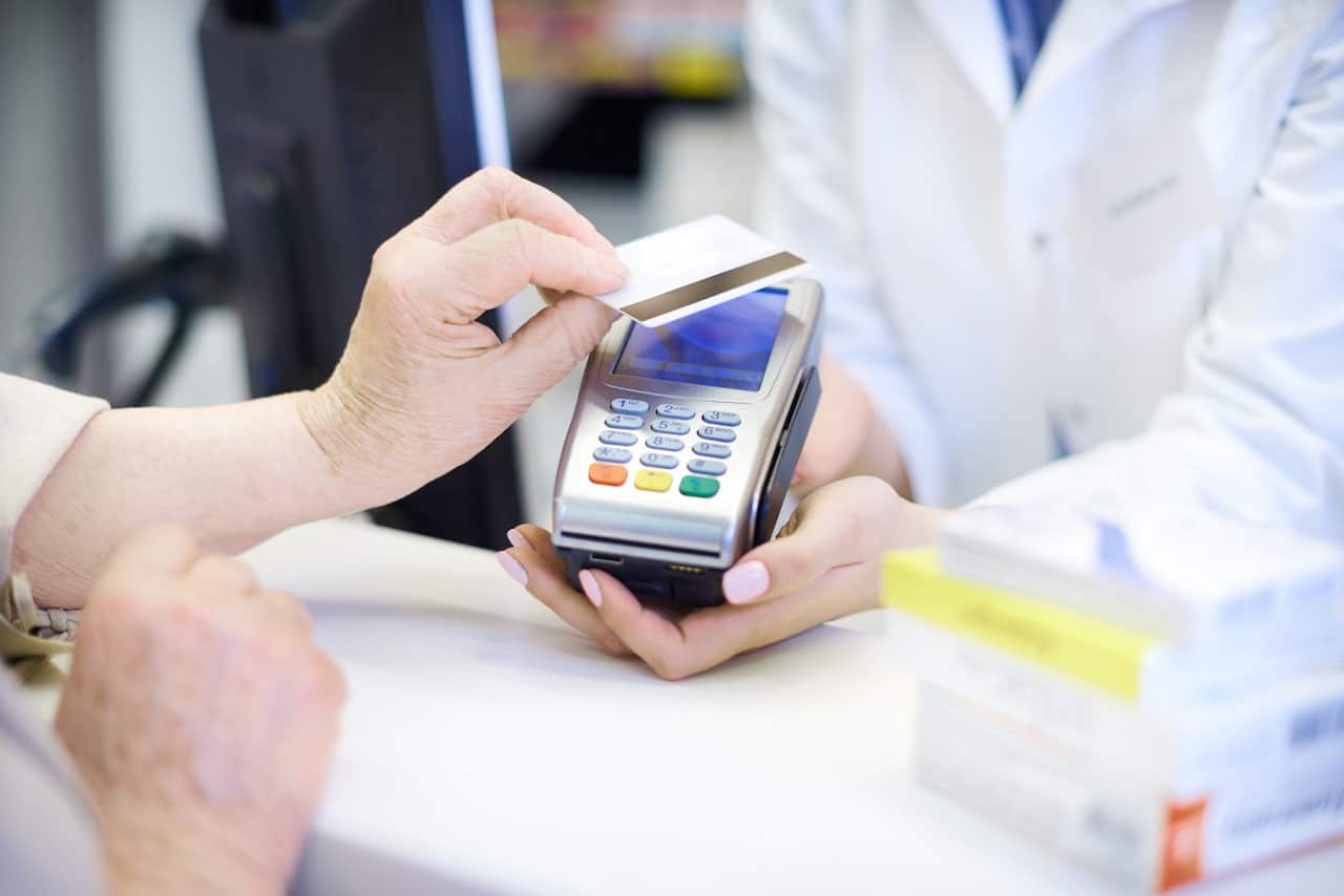 Patient paying using cash payment method through her debit card.