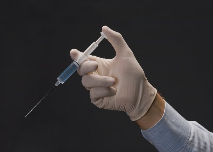 Epidural steroid injection concept.